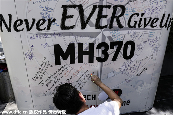 MH370 families remember one year on