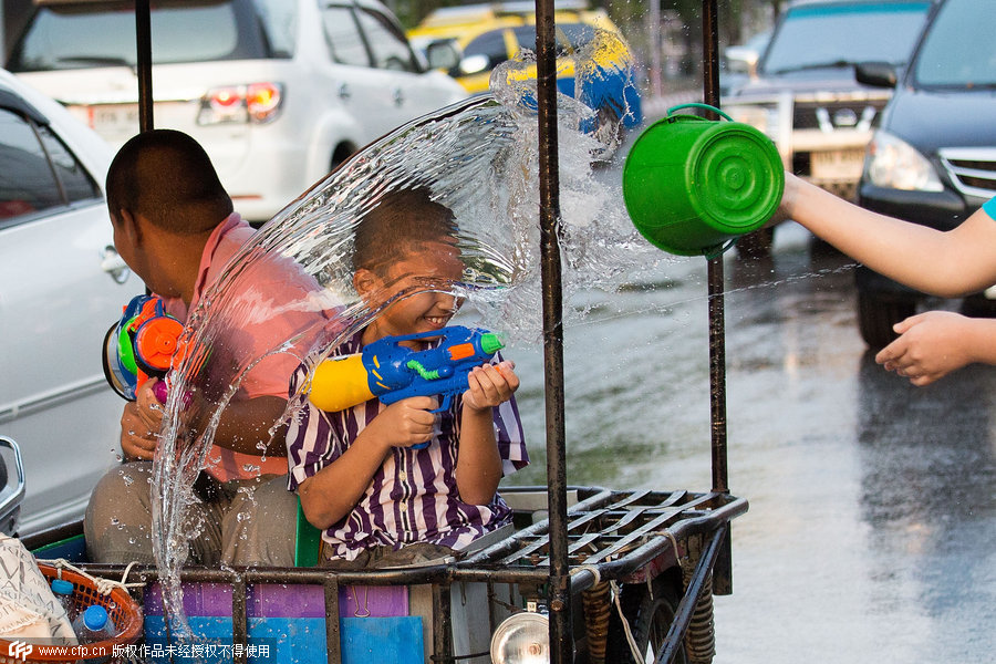 Traditional Thai New Year starts with a splash