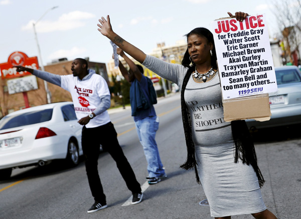 Wake held in Baltimore for black man who died after arrest