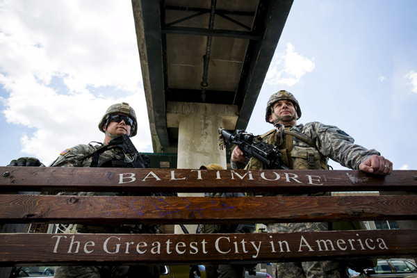 Police descend on Baltimore to enforce curfew after riots