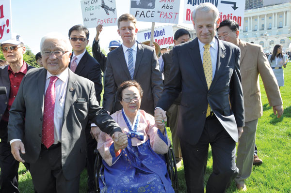 Protesters wrathful over lack of Abe apology