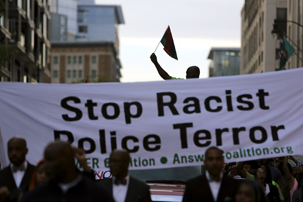 Marchers protest police violence in Baltimore, New York