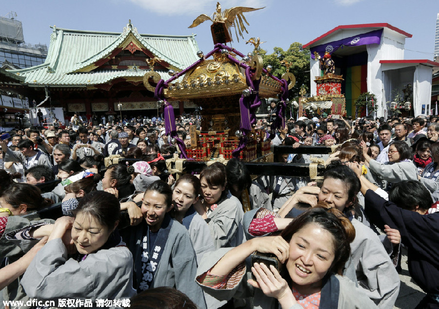 Portable shrines paraded through Tokyo to celebrate Kanda Festival