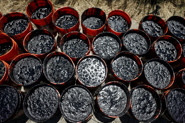 Crews work to clean California beach fouled by oil pipeline spill