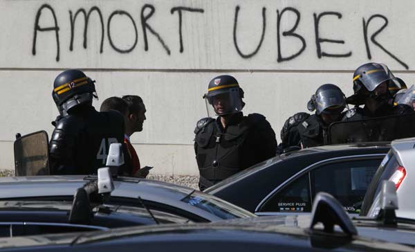 France cracks down on Uber after taxi driver protests