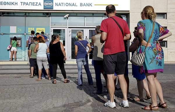 Greece imposes capital controls, banks to remain shut