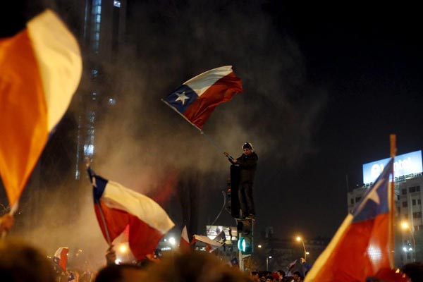 Two killed in street revels in Chile after soccer win