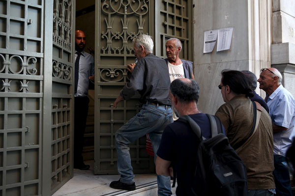 Greek banks reopen as Tsipras eyes return to normal