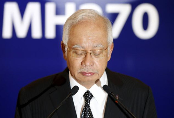 Malaysia confirms wing part washed up on La Reunion coast is from missing MH-370