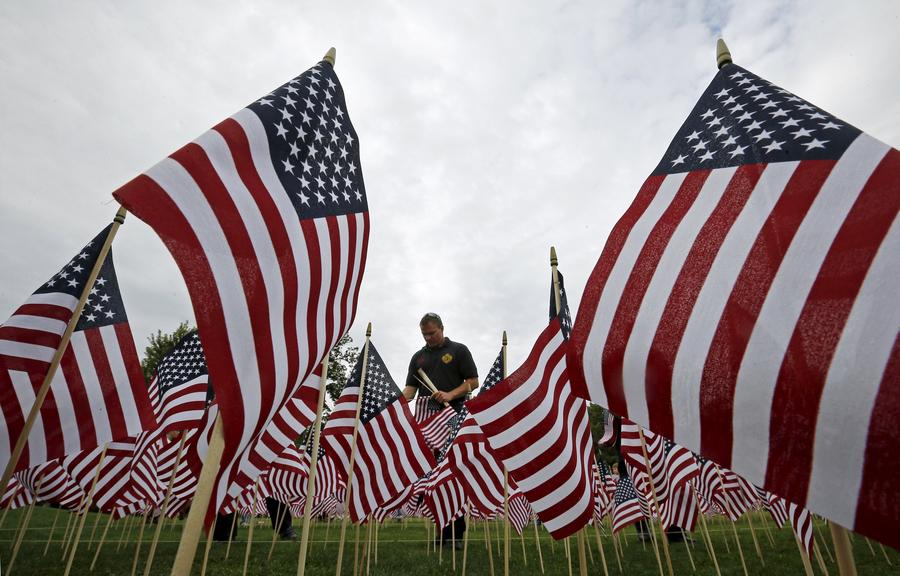 Americans mark the 14th anniversary of 9/11 attacks