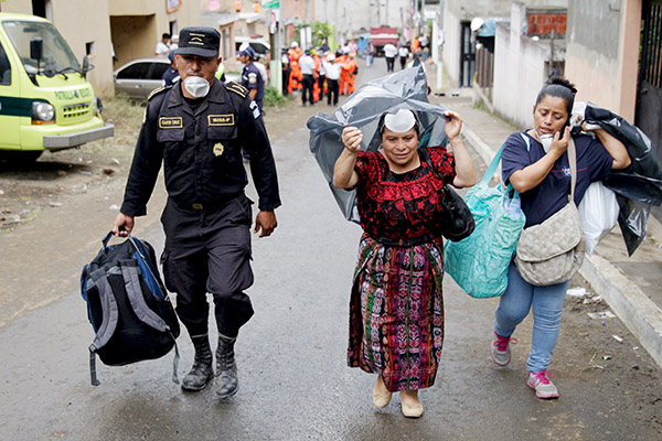 Families mourn victims of Guatemala landslide, hundreds feared dead