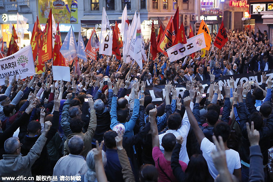 Thousands protest in Turkey after deadly suicide bombings