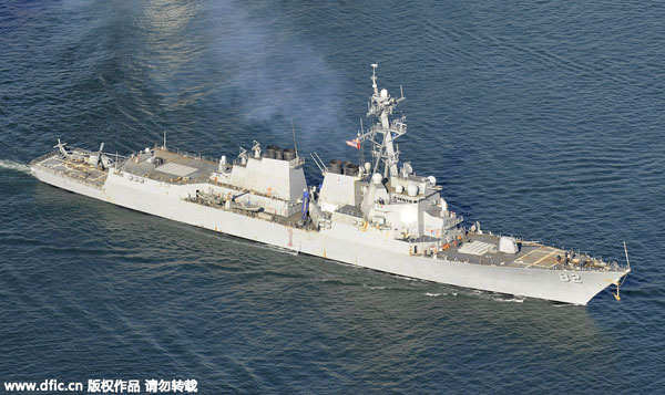 US warned over patrol by warship