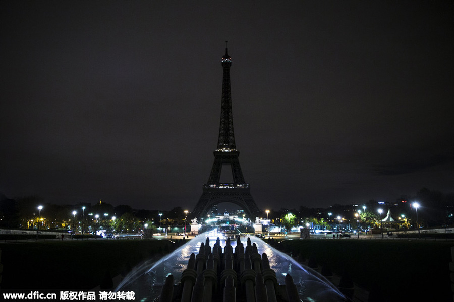 Eiffel Tower goes dark as France mourns terro
