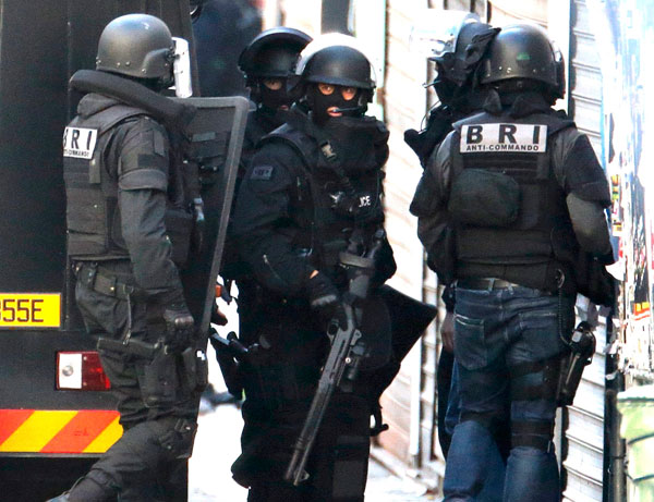 Two die in police raid targetting suspected Paris attack mastermind