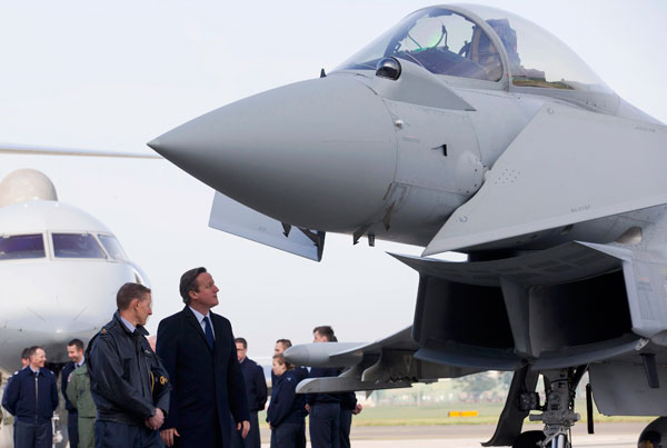 UK's Cameron says to boost defence spending by 12 bln pounds