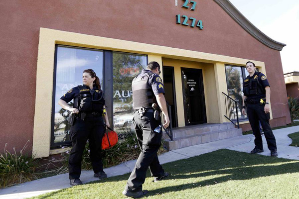 Shooting rampage at California social services agency leaves 14 dead, 17 wounded