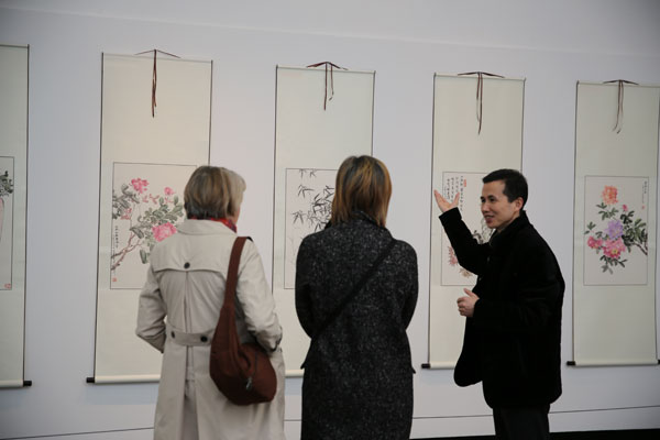 International friendship blossoms in peony painting