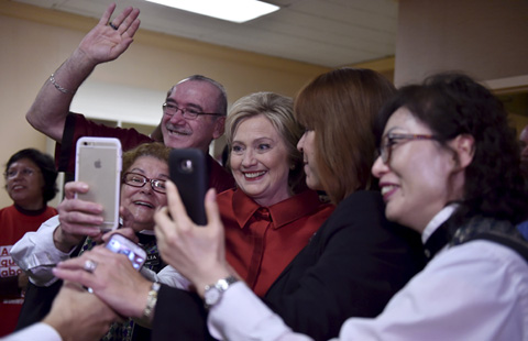 Clinton scores narrow win over Sanders in Nevada caucuses