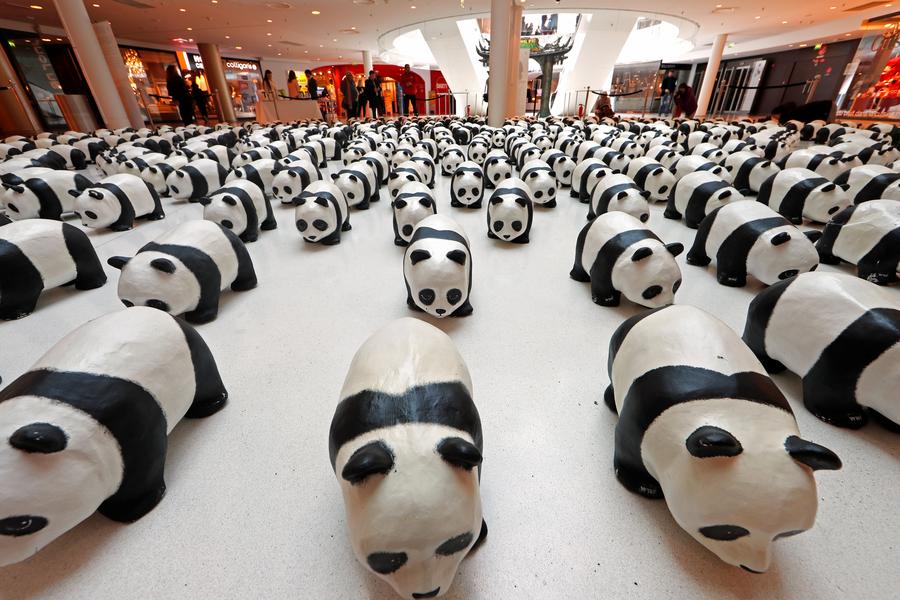 1,600 papier-mache pandas land in Paris