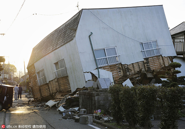 Strong quake in Japan kills at least nine, nuclear plants safe