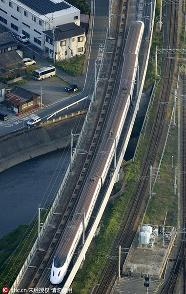 Strong quake in Japan kills at least nine, nuclear plants safe