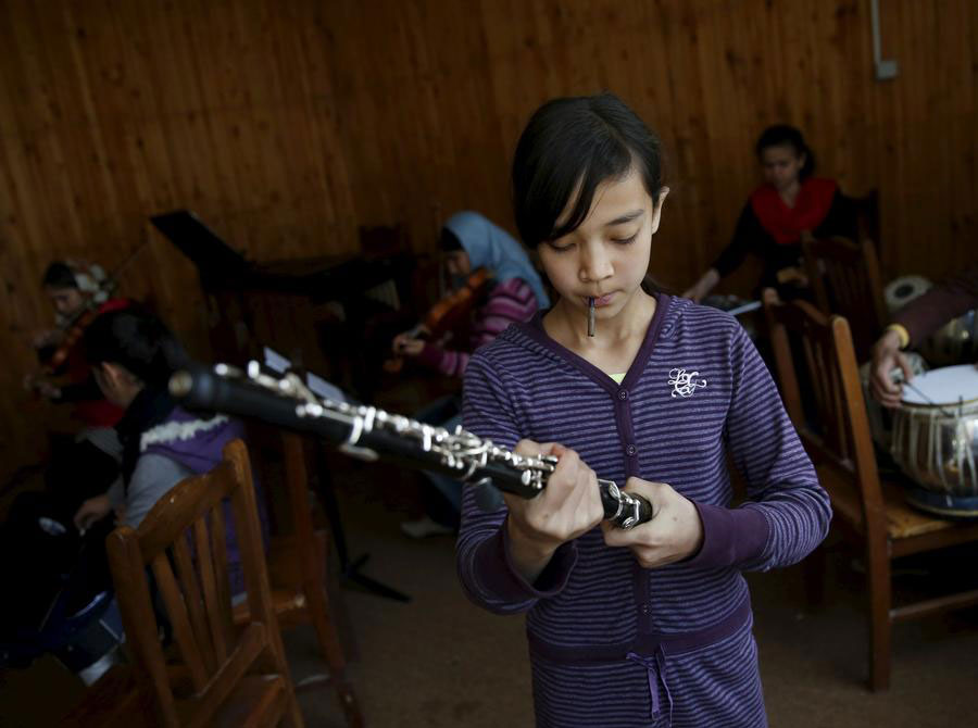 Afghan teenager braves threats to lead women's orchestra