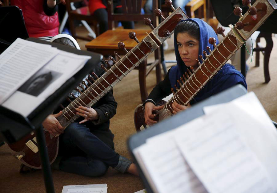 Afghan teenager braves threats to lead women's orchestra