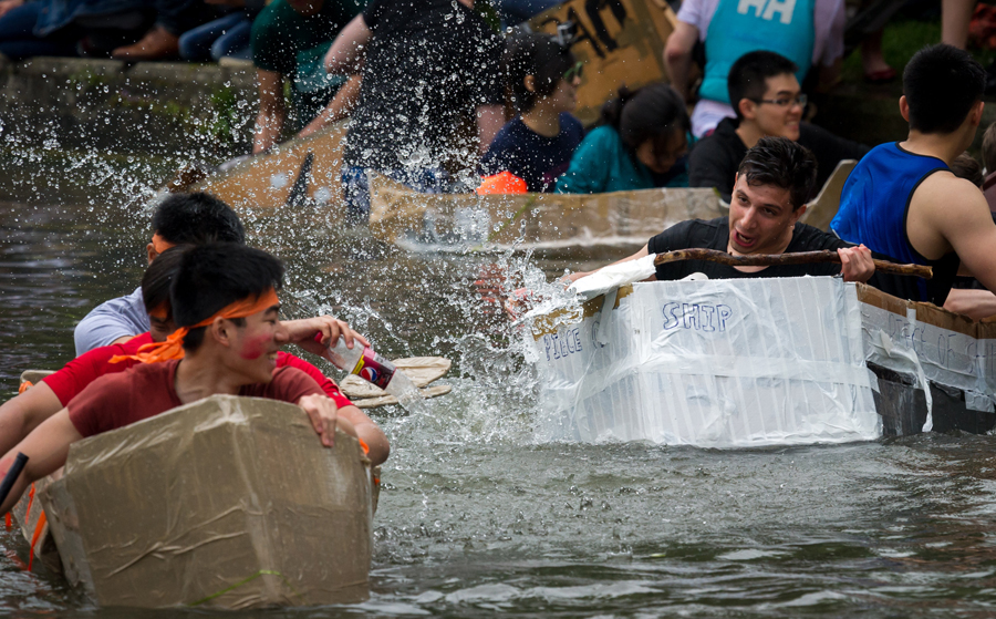 Cambridge students celebrate end of exams with cardboard boat race