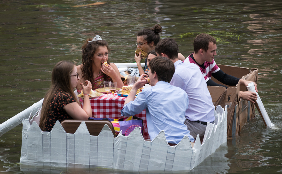 Cambridge students celebrate end of exams with cardboard boat race