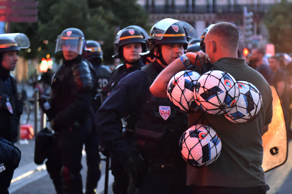 French riot police arrest 323 soccer fans on violence charges