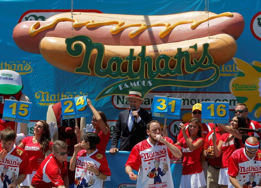 Hot dog-eating champ tastes victory again in US contest