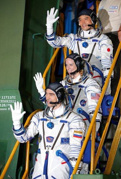 Multinational crew blasts off for space station