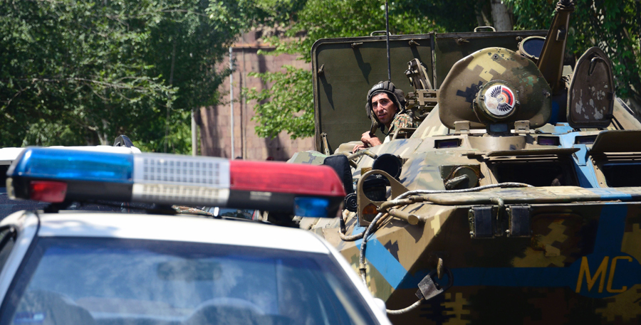 Armed men in Armenia seize police station, demand politicians' release