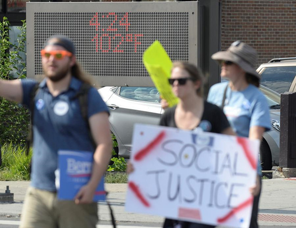 Sanders supporters boo as he urges them to elect Clinton US president