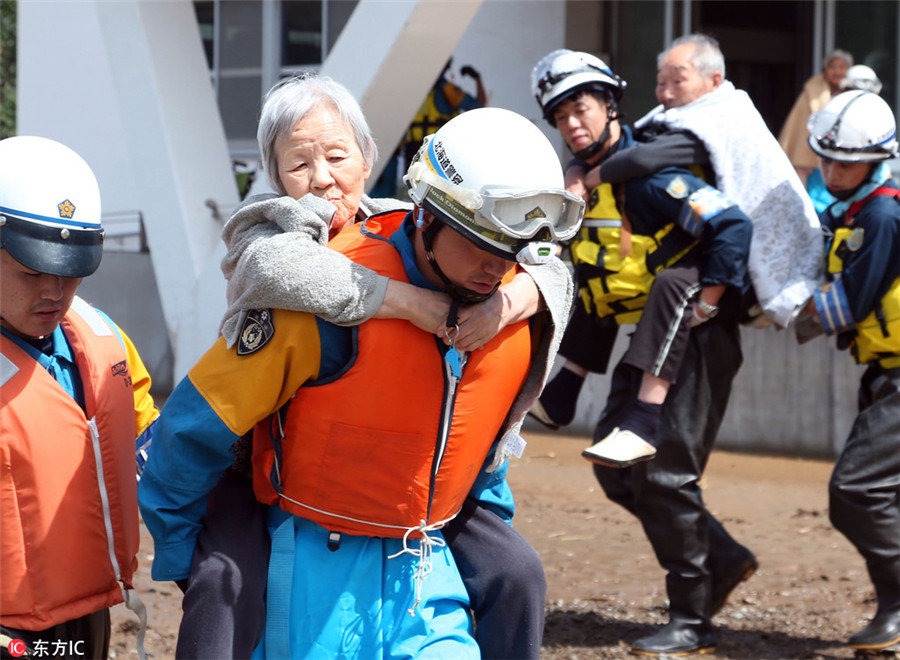 Typhoon kills 9 in Japan's old people's home as toll hits 11