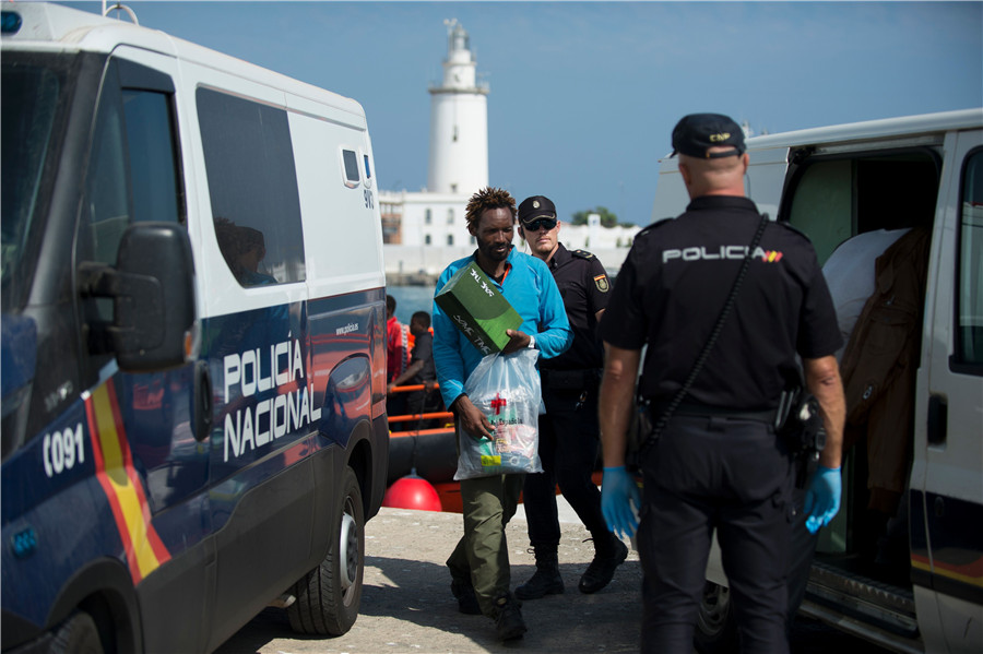 Back to safety: Spanish coast guard rescues African migrants