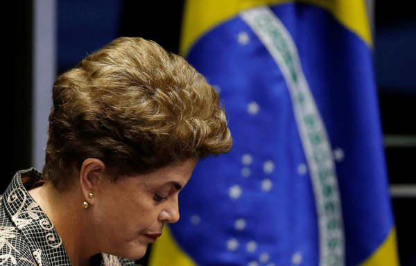 Temer sworn in as president of Brazil, Rousseff vows resistance