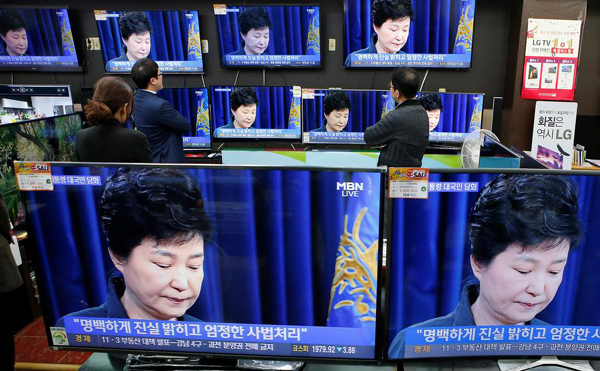 S. Korean president says to accept investigation over scandal if necessary