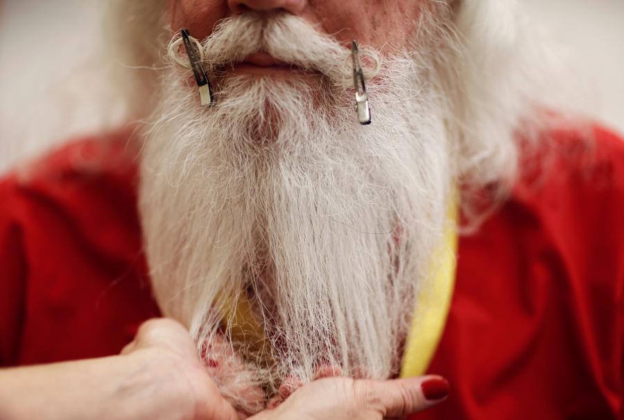 In photos: The art of becoming Santa