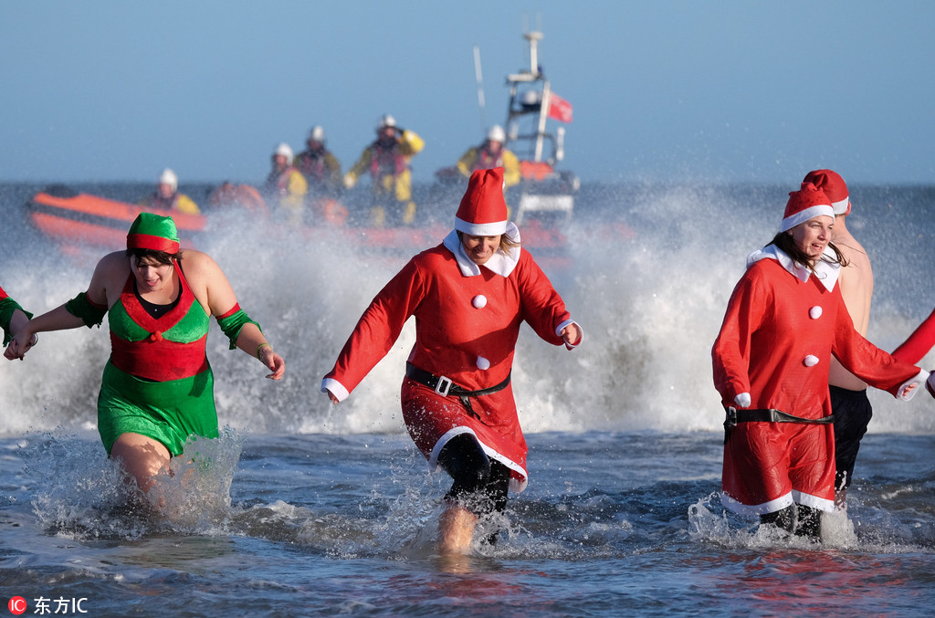 Boxing Day swimmers brave icy North Sea