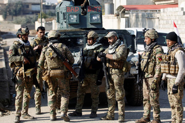 Iraqi forces fight fierce clashes in Mosul