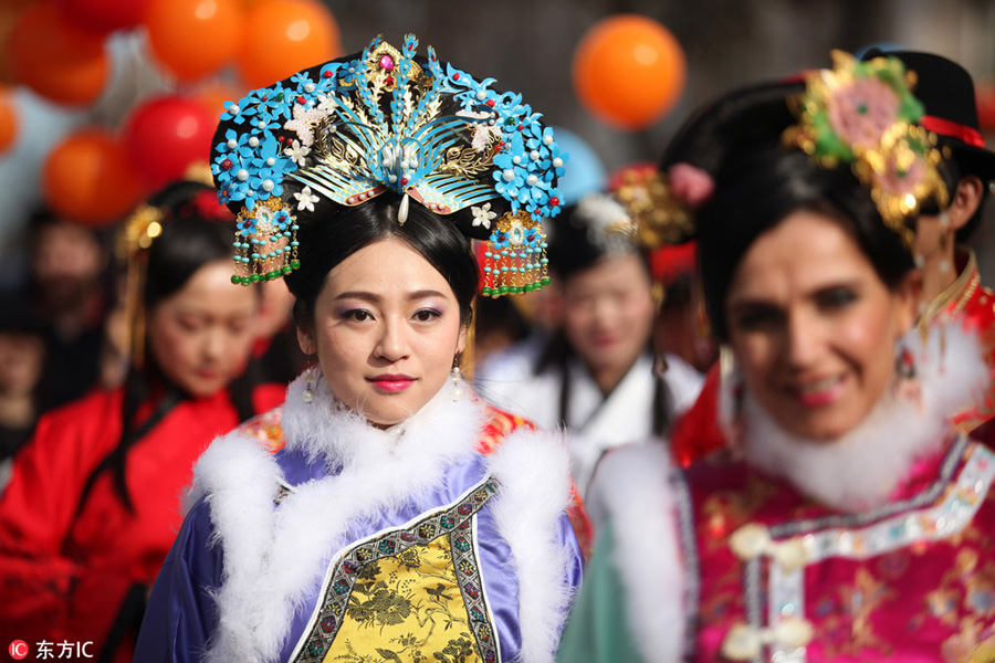 Traditional Chinese dresses shine in overseas Spring Festival celebrations