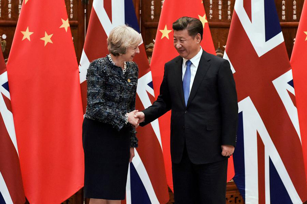 China invites Britain's May to visit 