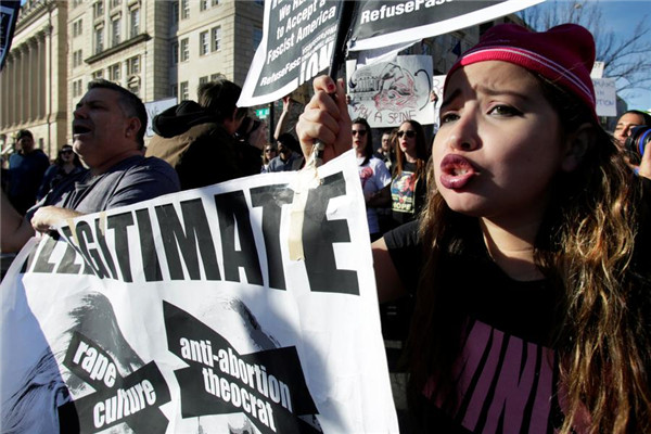 Thousands of demonstrators across US say 'Not My President'