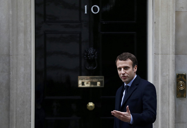 France's Macron meets PM May in London, vows to stand up for EU