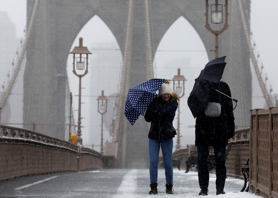 Flight cancellations persist as storm weakens in US Northeast