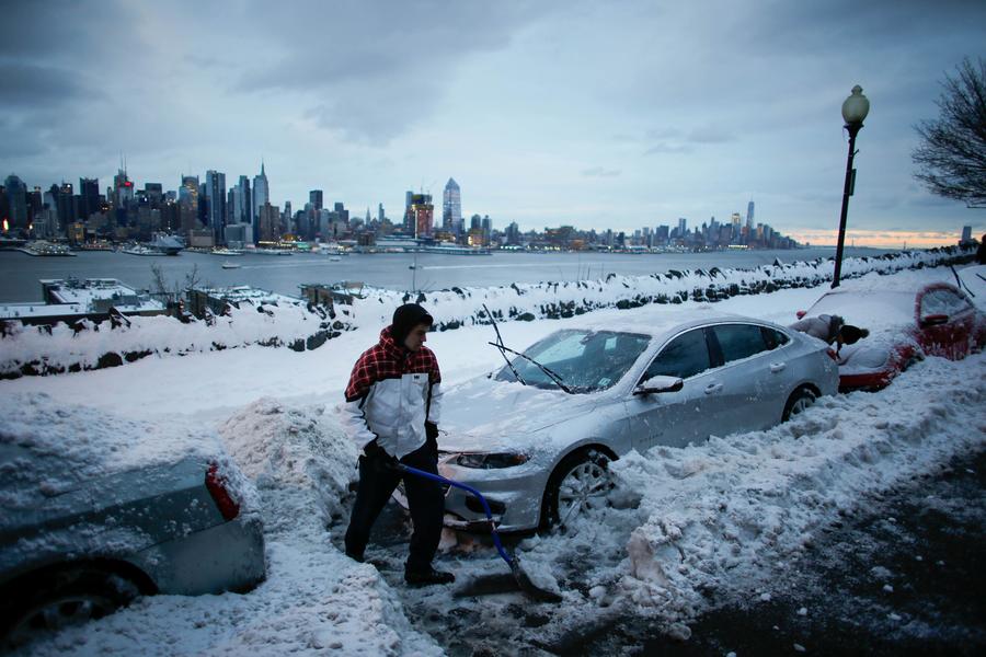 Flight cancellations persist as storm weakens in US Northeast