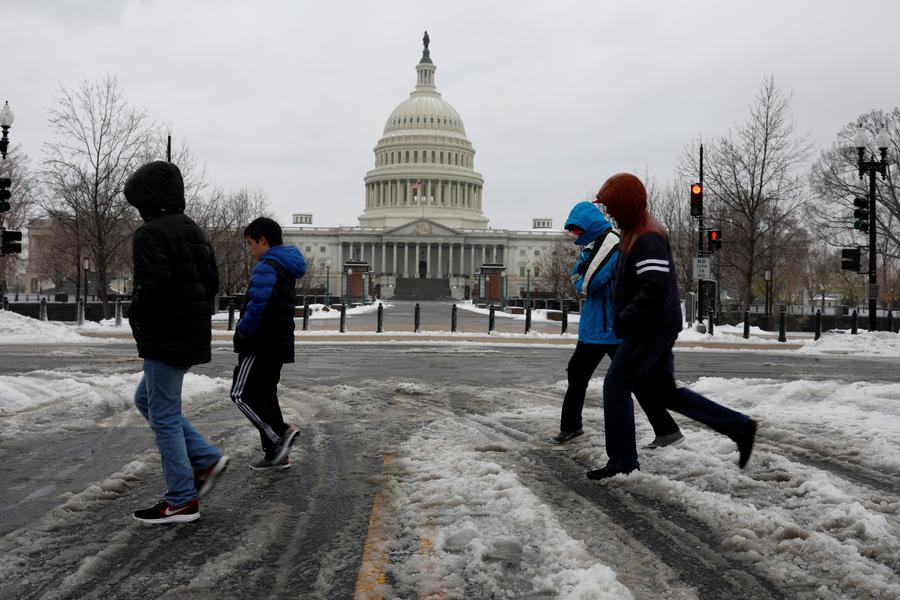 Flight cancellations persist as storm weakens in US Northeast