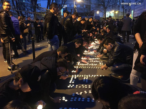 Chinese community holds protest in Paris against death of one Chinese national